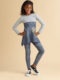 A solid bodice connects to a mock faded jean print skirt with a sequin-accented graphic and asymmetrical hem for a cute look.Crewneck Long sleeves Pullover style A-line silhouette Empire waist Inverted U-shaped hem 85% rayon/15% spandex Hand wash Additional InformationKid's Apparel Size Guide 