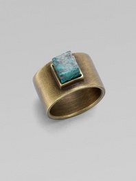 A structural piece with a square, center turquoise stone. TurquoiseBrassWidth, about ½Made in USA