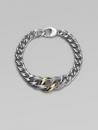 A chunky strand of graduated sterling silver links includes two with a cabled texture and one of smooth 18k gold. Sterling silver and 18k yellow gold Length, about 7½ Lobster clasp Made in Italy