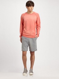 Laid-back style is as simple to achieve as donning these cotton shorts.Drawstring, elasticized waistbandSlash pocketsFrayed hemInseam, about 7CottonMachine washImported