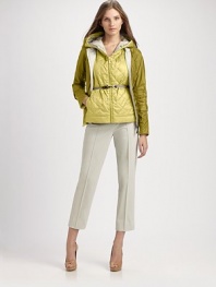 This lightweight design is perfect for braving the weather.Gathered necklineFront zip with contrast trimContrast belt with metal buckleSide slash pocketsButton details on sleevesWaterproofReversibleAbout 23 from shoulder to hem64% polyester/36% nylonFill: goose downImportedModel shown is 5'10 (177cm) wearing US size 4. 