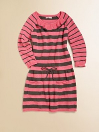 Sweet stripes in sweater-soft knit, detailed with a ruffle at the neck, rolled hems and patch pockets.Round banded neckline with ruffleLong raglan sleeves with ribbed and rolled cuffs, one with Juicy logoSlightly dropped waist with stitched bowPatch pocketsRibbed and rolled hemPullover styling60% cotton/30% nylon/10% angoraMachine washImported