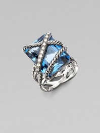 From the Cable Wrap Collection. A stunning London blue topaz is wrapped in cables and diamonds in sterling silver. London blue topazDiamonds, 0.42 tcwSterling silver Width, about ½Imported 