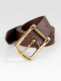 Equestrian-inspired buckle accents this smooth, simple design of fine leather.LeatherAbout 1½ wideImported