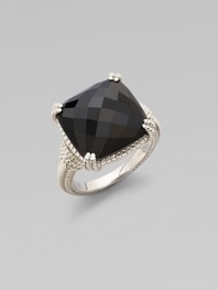 From the Giftables Collection. A sparkling black onyx stone in a four-prong sterling silver setting.Black onyxSterling silverWidth, about ½Imported 