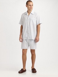 Relax and lounge-around in this remarkably comfortable two-piece short set, in easy-fitting, lightweight cotton. Machine wash. Imported.SHIRTSpread collarButtonfrontChest patch pocketSHORTSAdjustable two-button waistButton flyNo pocketsInseam, about 3½
