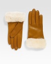 A soft, dyed shearling cuff and luxurious cashmere lining help make this leather style a cold weather essential. About 9 longSpecialist dry cleanImportedFur origin: Spain