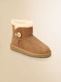 This mini version of the Bailey boot is a warm, plush and fuzzy dream come true for tiny feet.Logo button-and-loop closureSheepskin upperSheepskin liningMolded EVA sole is light and flexiblePadded insoleImported