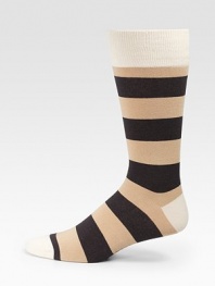 Bold stripes add color and warmth underfoot.Mid-calf heightRibbed cuff72% cotton/26% nylon/2% spandexMachine washImported