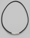 A tightly woven necklace that maintains its shape and strength over time in fine leather with a sterling silver station detail. From the Bali Collection Leather Sterling silver Length, about 20 Push-lock clasp Imported