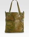 This smartly styled tote features a leather body with a camo-pattern for a military chic appeal.Zip closureTop handlesAdjustable shoulder strapsFully linedLeather15W x 17H x 1D Imported