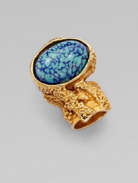 Held in an intriguing freeform setting, a stone of colorfully mottled glass is suspended above your finger. Glass Textured goldtone Length, about 1½ Made in Italy  Please note: Due to organic shape of the ring, sizing may vary. We recommend ordering one size up.
