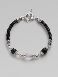 From the Iris Collection. From the carved frosted rock crystal bead to the smooth matte onyx beads and braided leather cord, this piece is a study in understated elegance. Sterling silver Toggle closure Length, about 7½ Imported 