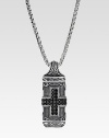 A fine chain holds a tablet pendant hand-forged with dimensional detail and faceted stones in sterling silver. Sterling silver Chain length, about 26 Made in USA 