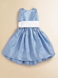 A classically preppy dress is rendered in gingham-printed silk taffeta for a perfect party ensemble.JewelneckSleeveless with slim strapsBack buttonsGather waist with solid sashFull skirt with ruffled petticoatSilk taffetaDry cleanImported Please note: Number of buttons may vary depending on size ordered. 