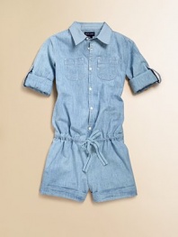 A classic chambray workshirt transforms into a casual, playful romper, featuring a drawstring waist, rolled-up sleeves and a cuffed hem.Spread collar with button frontLong sleeves with single button cuffs and interior button straps for rollingRear elasticized waist with drawstring frontPatch pockets at chest and on-seam hand pocketsCuffed hemCottonMachine washImported