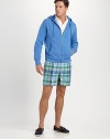 The classic Traveler swim short is rendered in sleek, quick-drying microfiber in a vibrant plaid pattern for cool, casual beach style.Elastic waistband with drawstring tie closureSide slash pocketsBack waist drainage grommetsBack flap patch pocketMesh liningInseam, about 4¾52% cotton/48% nylonMachine washImported