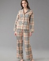 Menswear-styled set is chic and comfy in a big bold check. Piping trim Notch collar top Button front Elastic waist pants French cotton; machine wash Imported