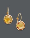 Uplift your spirits with a burst of sunshine. These sparkling drop earrings feature bezel-set round-cut citrine (3-1/2 ct. t.w.) set in 14k gold. Approximate drop: 1/2 inch.