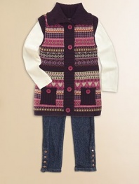 A preppy Fair Isle print adds a punch of color to an otherwise simply sweet sweater.Turtleneck open frontSleeveless Two front patch pockets with button closure Front button closureDrop-waist with pom-pom bow detail55% cotton/45% acrylicMachine washImported