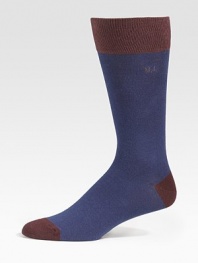 Contrast cuff, heel and toe define comforting socks that offer warmth without bulk. Mid-calf height Ribbed cuff 72% cotton/26% nylon /2% spandex Machine wash Imported 