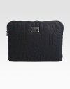 Signature quilted nylon zips around your computer for a stylish cover.Zip-around closureFully lined13¾W X 10½H X 3/4DImported