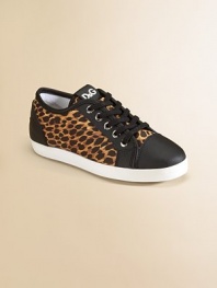 Classic lace-up sneakers with leather trim in a leopard print.Lace-up65% polyester/31% leather/4% spandex upper95% polyester/5% leather liningRubber solePadded insoleImported