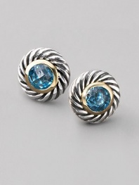 From the Color Classics Collection. In a luscious cookie shape, a center of faceted blue topaz set in 18k gold, surrounded by a textured swirl of sterling silver. Blue topaz Sterling silver and 18k yellow gold Diameter, about ½ Post back Imported
