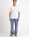 A stylish woven cotton pant for lounging or bedtime in a bold check pattern.Elastic waistCovered placket button-flySide slash pocketsInseam, about 32CottonMachine washImported