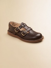 English-style leather classics, perfect for school, play and partywear. Twin T-straps with adjustable buckles Perforations on toe Padded insole Rubber traction sole Leather Imported Please note: It is recommended that you order ½ size smaller than measured. If your child measures a size 7.0, you may want to order a 6½. 