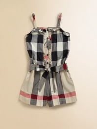 A classic one-piece romper is given a luxe update with a sweet ruffle trim, tie waist and the requisite check print.Straight necklineSlender strapsFront button placket with ruffle trimBelted waistSide slash pocketsCottonMachine washImported Please note: Number of buttons may vary depending on size ordered. 