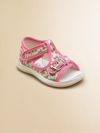 Vibrant flowers and contrasting trim adorn these sweet little t-strap sandals for baby.Adjustable buckle and grip-tape closureCanvas upperCanvas liningRubber solePadded insoleImported