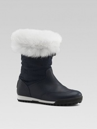 Fluffy fur cuffs cold weather boots with GG fabric shafts and curly shearling linings.Nylon upper Shearling lining Rubber sole Made in Italy