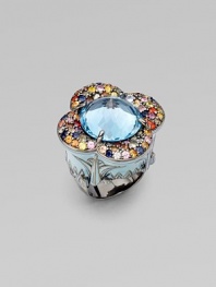 From the Floral Nouveau Collection. Pavé set multi-colored sapphire petals ring a center blue topaz, with baby blue enamel accents on the band.Blue topaz Sapphire Sterling silver Enamel Diameter, about 1½ Width, about 1½ Imported