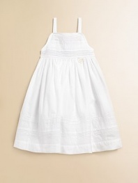 This angelic A-line silhouette is topped with pintucked and embroidered details.SquareneckSpaghetti strapsBack buttonsFull skirtCottonMachine washImported Please note: Number of buttons may vary depending on size ordered. 