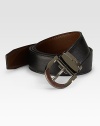 A modern classic crafted in reversible calfskin leather with an adjustable gancino buckle. Reverses from black to brown Leather Ruthenium buckle About 1½ wide Made in Italy 