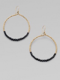 A pretty hoop style with 14k gold and oxidized sterling silver beads. 14k gold beadsOxidized sterling silver beadsLength, about 2French hookMade in USA 