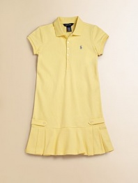 Flirty box pleats detail the hem of this chic drop-waist silhouette with button tab detail. Polo collar Short sleeves Banded cuffs Button down placket Embroidered logo pony at chest Button-through tabs at sides Box pleated hem Drop-waist 98% cotton/2% elastane Machine wash Imported 
