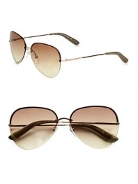 A classically chic style with playful heart etched lenses. Available in rose gold with brown gradient lens. Logo temples100% UV protectionImported