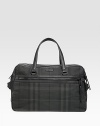 A soft-sided case for wherever the business day takes you in stylish, enduring nylon with leather detail and an iconic check pattern. Zip closures Top handles Two compartments with separate openings Exterior zip pocket Interior zip, slip pockets 21¼W X 12½H X 9½D Made in Italy 