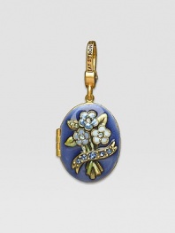 Sapphire-colored CRYSTALLIZED - Swarovski Elements sparkle on this handcrafted, hand-enameled birthstone locket that opens to hold a favorite photo. Crystal Enamel 18k goldplated brass & brass-plated pewter Month indicated on the back Length, about 1¼ Width, about 1 Spring clip clasp Made in USA