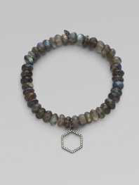 This labradorite beaded, stretch design is accented with a diamond embellished rhodium hexagon charm for a sleek look. Labradorite beadsRhodiumDiamonds, .16 tcwLength, about 6¾Elastic slip-on styleMade in USA of imported materials