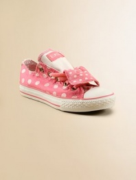 Itsy bitsy polka dots spread cheer on these cute and comfy lace-up kicks with double tongue.Double tongueLace-upCotton upperTextile liningRubber soleTraditional Chuck insoleImported