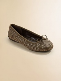 Herringbone wool ballet style with elasticized strap for a sure fit.Tie frontElastic strapPadded insoleRubber soleImported