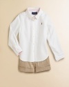 An all-season favorite and wardrobe essential in soft cotton oxford. Button-down collar Long sleeves with button barrel cuffs Button placket Embroidered polo pony logo Back yoke and box pleat Shirttail hem Cotton Machine wash Imported Please note: Number of buttons may vary depending on size ordered. 
