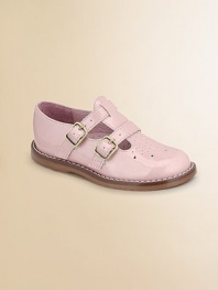 A chic T-strap design in metallic, finished with a double buckle closure and perforated teardrops on the toe for a precious look. Double buckle closure Synthetic upper Rubber sole Padded insole Leather lining ImportedPlease note: It is recommended that you order one ½ size smaller than measured. If your child measures a size 7.0, you may want to order a 6 ½. 