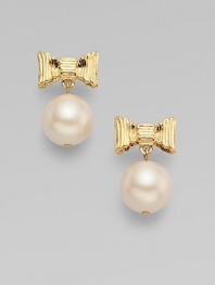 A feminine creation of luminous pearls suspended from sweet bows.12k goldplating Length, about 1¼ Post backs Imported