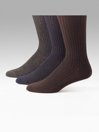 EXCLUSIVELY OURS. Rib-textured in a fine merino wool/silk featured in charcoal, brown and navy. Also offered in black Over-the-calf length Hand-link toe Merino wool/silk/nylon/Lycra; machine wash Made in Italy