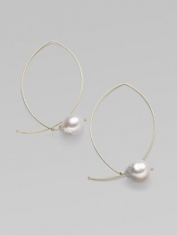 A delicate marquis shape, delineated in 14k gold wire, is capped by a lustrous pearl for a modern twist on a classic hoop. White freshwater baroque pearls 14k yellow gold Length, about 1¾ Width, about 1 Pierced Made in USA