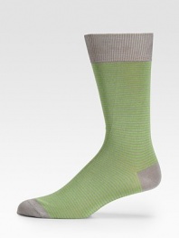 Super soft, with a hint of stretch in neatly striped cotton knit.Mid-calf height80% cotton/20%nylonMachine washImported